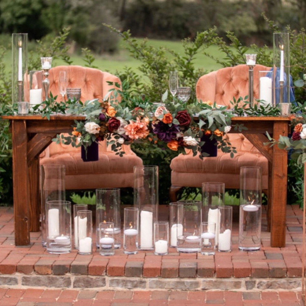 Lings moment sweetheart table swags. Artificial flowers. Arrangments.